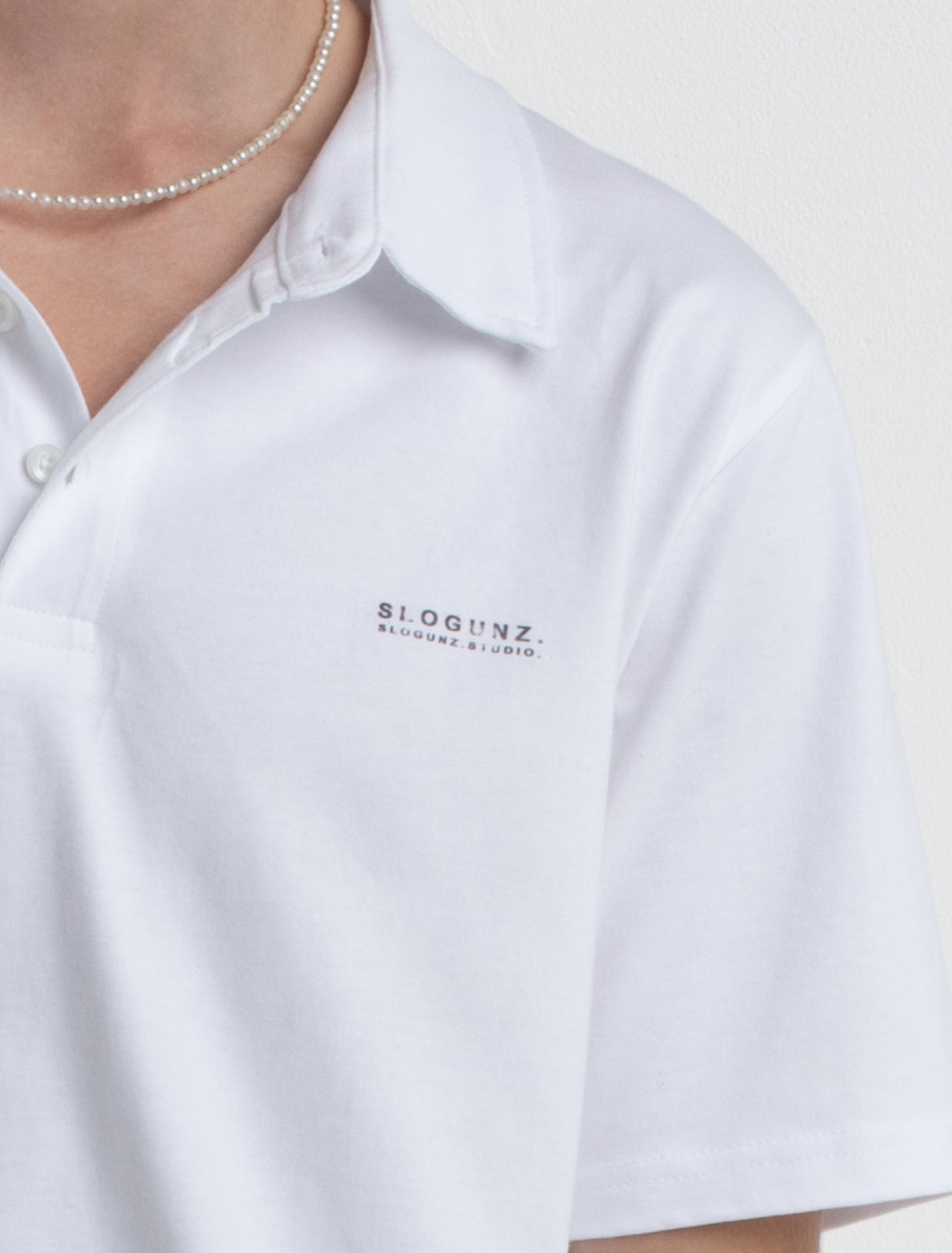 TEMPTED graphic white polo shirt