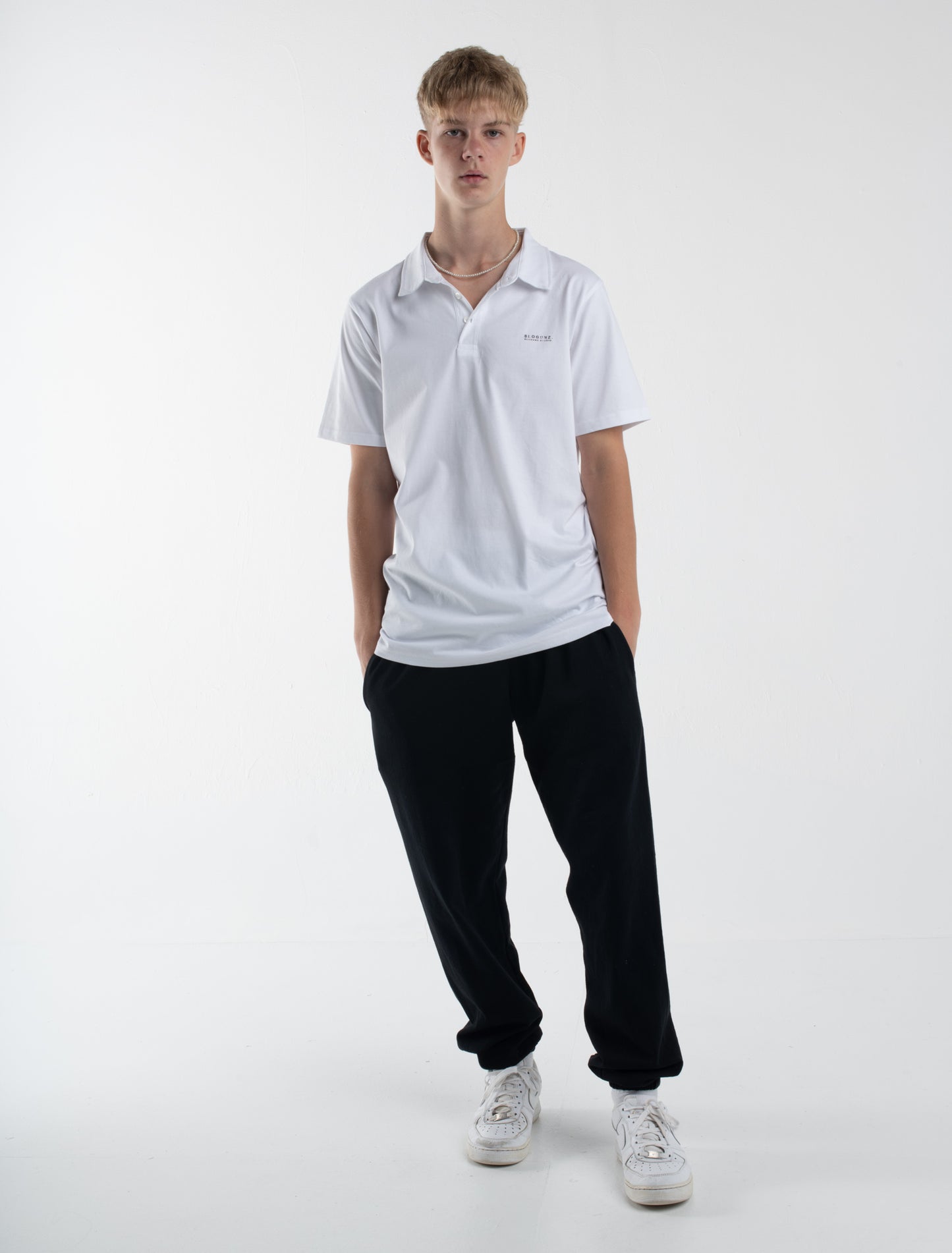 TEMPTED graphic white polo shirt